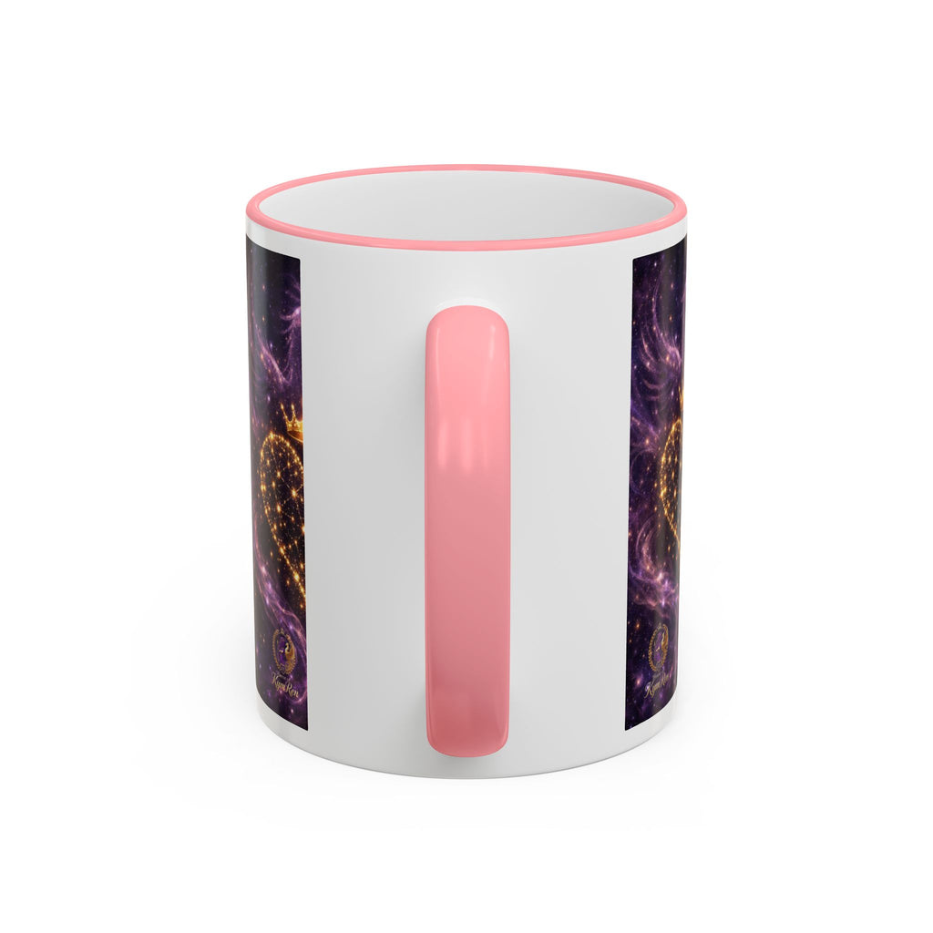 Mug with pink handle and colorful design on a white background