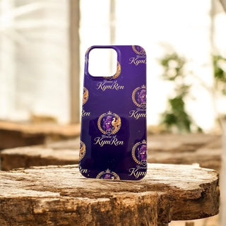 Purple phone case with 'Kym Ren' branding on a wooden surface