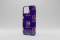 Phone case with a purple and gold design on a textured surface