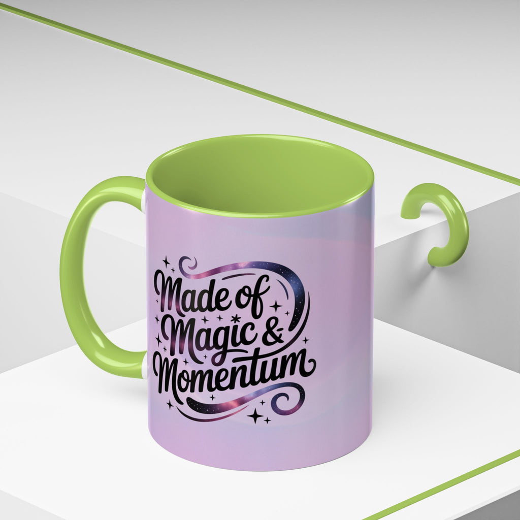Purple mug with green interior and handle featuring text 'Made of Magic & Momentum' on a white background.
