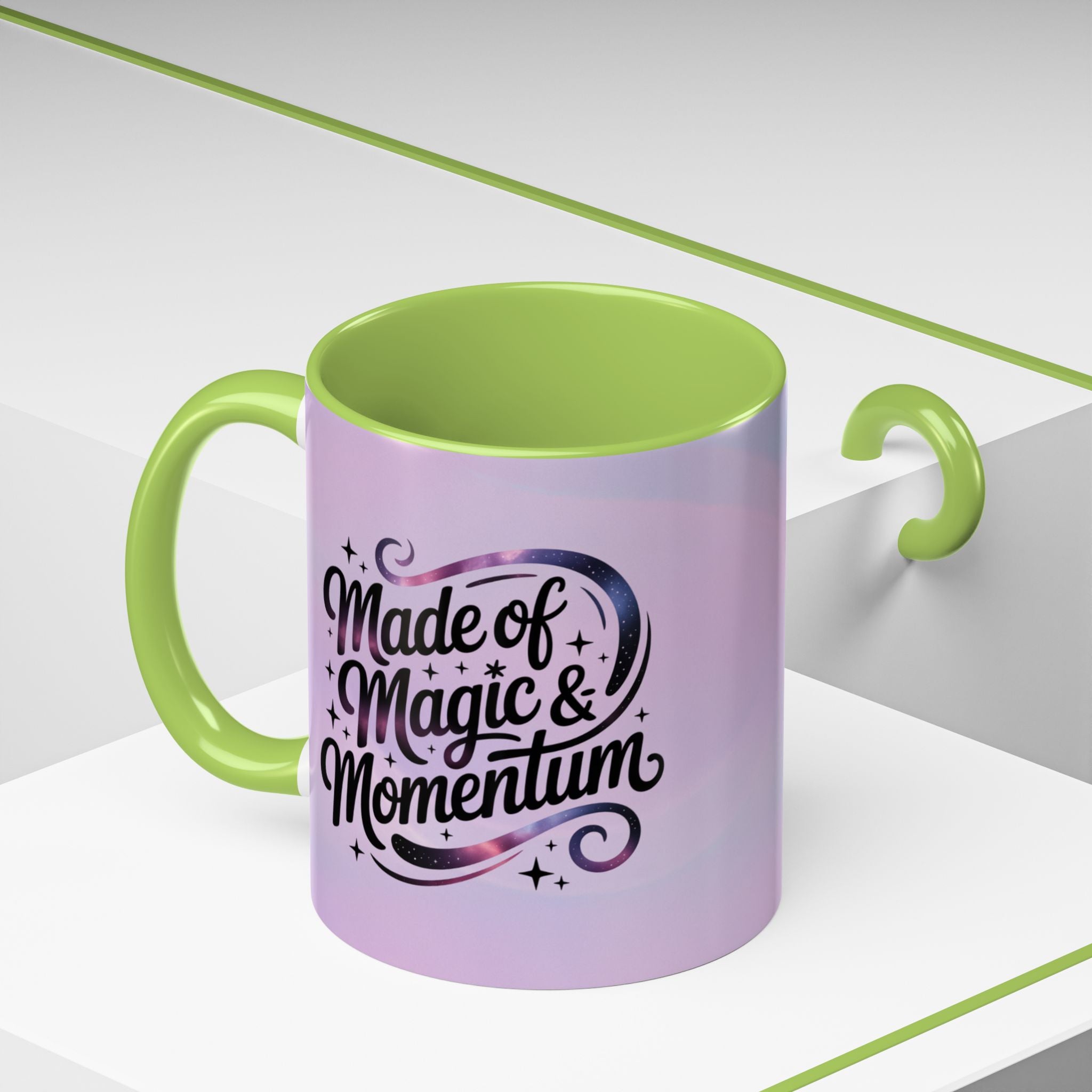 Purple mug with green interior and handle featuring text 'Made of Magic & Momentum' on a white background.