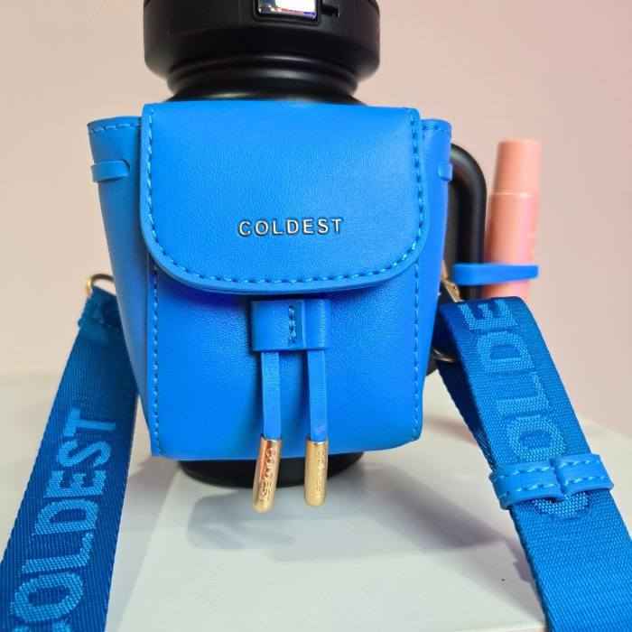 Blue camera case with 'COLDEST' branding on a neutral background