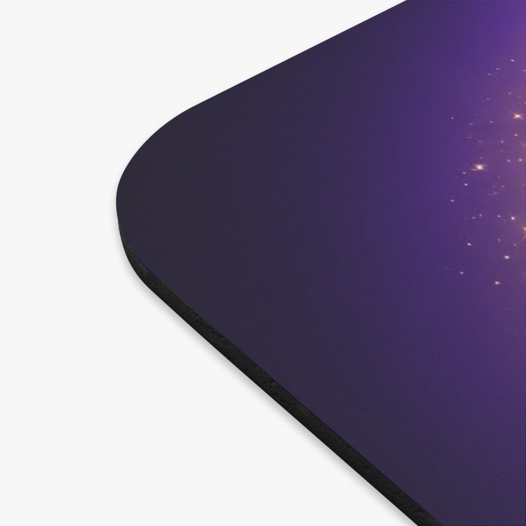 Black mouse pad with a gaming mouse on a purple background